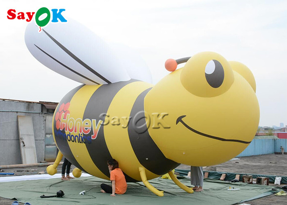 서 있는 만화 모형을 광고하는 주문 거대한 팽창식 꿀벌
